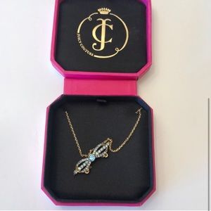Juicy Couture blue & gold paved bow necklace